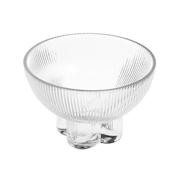 Clear glass bowl with ribbed texture on a white background