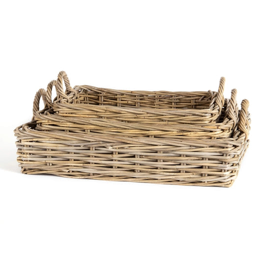 Woven rectangular basket with handles on a white background