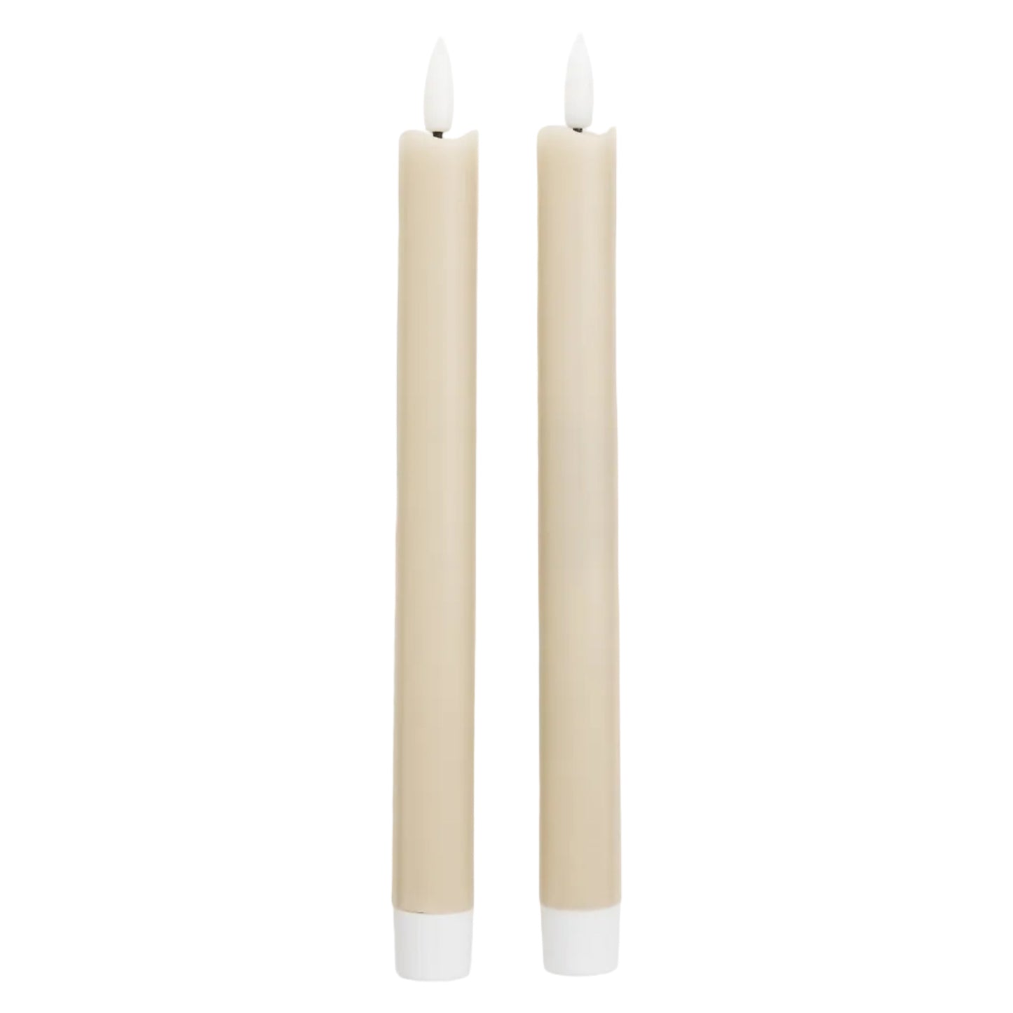 Two beige candles with white wicks on a white background