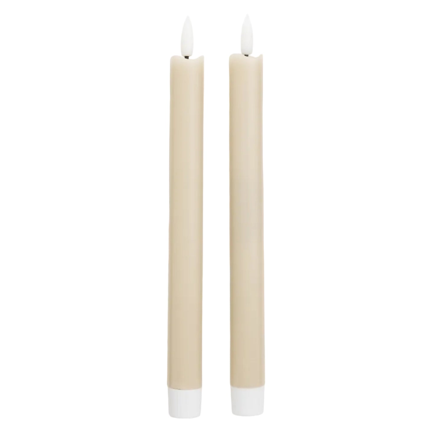 Two beige candles with white wicks on a white background